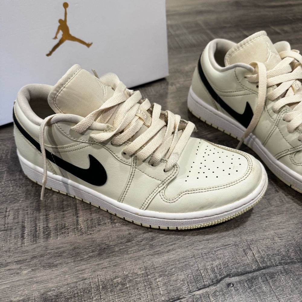 Nike Jordan Women’s beige and black Air Jordan 1 Low Coconut Milk 9